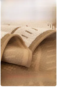 Detail of earth-tone sofa cushion with non-slip silicone particles and textured jacquard fabric