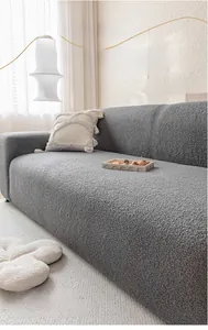 Detailed texture of gray teddy fleece sofa cover featuring thick waterproof fabric