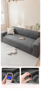 Detail of grey teddy fleece sofa cover showing elastic texture and formaldehyde-free test