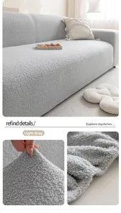 Macro detail of elastic light grey bouclé sofa cover fabric with high texture and soft pile