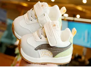 Detailed view of breathable mesh baby shoes with non-slip soles and velcro strap