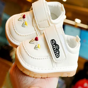 Soft leather toddler shoes with floral embroidery and non-slip rubber sole for infants