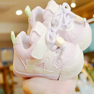 Pink toddler walking shoes with breathable mesh and protective rubber toe cap