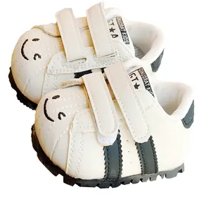 Scarpe primi passi per neonati con simpatico motivo a faccina e doppio velcro