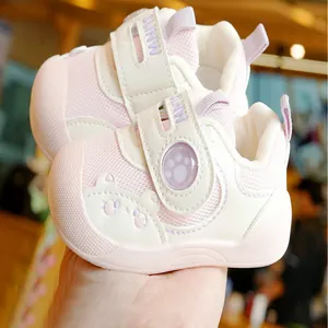 Pink and beige breathable mesh toddler walking shoes with double velcro and cat detail