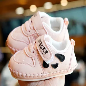 Pink soft-soled baby panda walking shoes with quilted faux leather and velcro straps