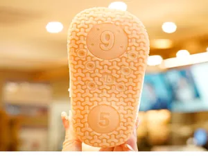 Close-up of flexible rubber anti-slip sole with Y-shaped patterns for toddler shoes