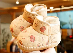Detail view of winter baby boots with quilted leather exterior and plush fleece lining