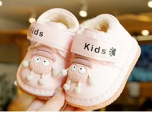 Close-up of pink toddler winter boots with warm plush lining and non-slip rubber sole