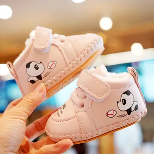 Pink infant winter walking shoes with soft fur lining and panda cartoon detail