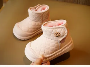Detailed view of pink toddler winter boots with warm plush lining and metal buckle