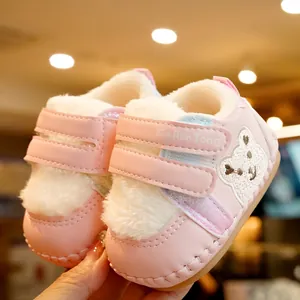 Pink faux leather baby walking shoes with plush faux fur lining and bear embroidery