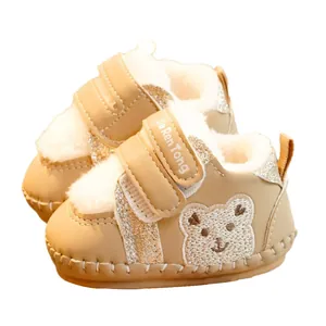 Warm fleece-lined baby walker shoes with cute bear embroidery and velcro closure