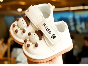 Detailed view of flexible anti-slip sole and soft PU material for baby walking shoes
