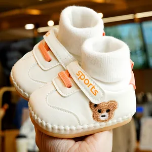 Infant winter soft sole walking shoes with white knit sock upper and cute bear embroidery