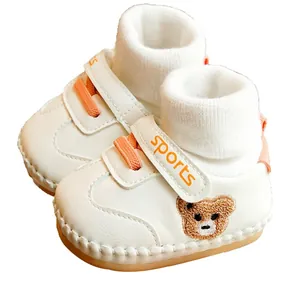 White baby walking shoes with soft soles and cute bear embroidery for toddlers