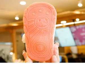 Detail of soft anti-slip rubber sole for toddler shoes with elephant pattern