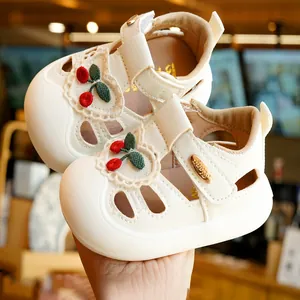 White toddler sandals with red cherry embroidery and non-slip rubber soles for girls