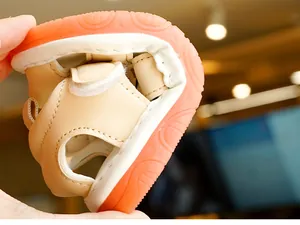 Detail of baby summer sandals showing high flexibility and soft bendable rubber sole