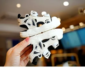 Detailed view of panda-themed baby summer sandals with non-slip sole and velcro strap