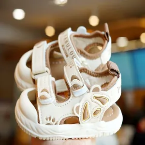 Toddler summer sandals with cute bear design and anti-slip rubber soles in cream brown