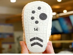 Close-up of flexible white rubber sole with anti-slip pattern for baby walker shoes
