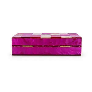 Acrylic evening clutch with marble patterns and colorful checkerboard top panel