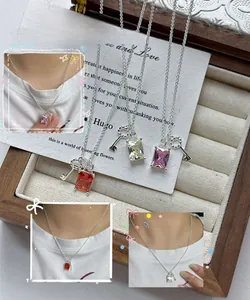 S925 silver key necklace detail with square zircon charms in red yellow and purple