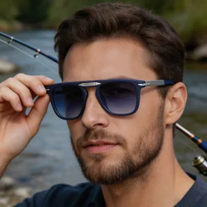 Close-up of a man wearing blue vintage folding sunglasses while fishing outdoors
