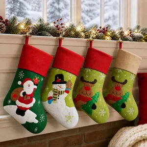 Detail of four Christmas stockings with Santa and reindeer hanging on a festive mantelpiece