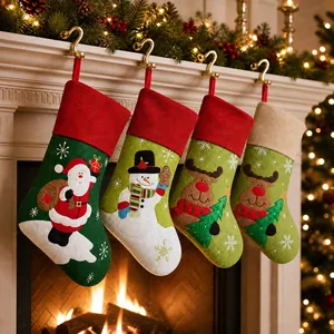 Set of four Christmas stockings with 3D Santa and Reindeer hanging on a warm fireplace