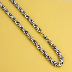Detailed view of polished stainless steel twisted chain necklace with secure lobster clasp