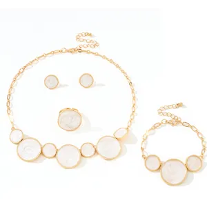 Irregular round white enamel jewelry set with necklace bracelet earrings and ring in gold