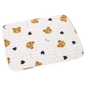 Quilted pet sleeping mat with cute bear and heart pattern for dogs and cats, white color