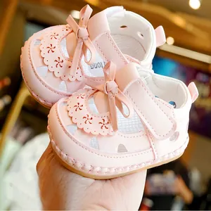 Pink infant girl summer sandals with butterfly bow and soft non-slip sole for toddlers