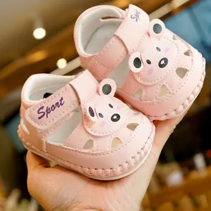 Pink infant summer sandals with soft non-slip soles and cartoon bear decoration