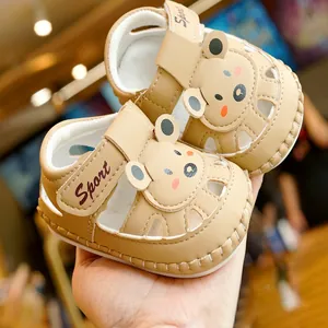 Breathable khaki infant sandals with soft non-slip soles and cute cartoon bear decor