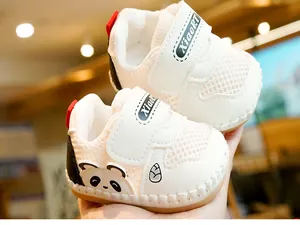 Detail of baby summer sandals featuring breathable mesh and cute panda motifs on side