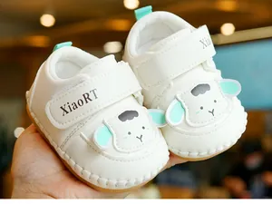 Detailed close-up of baby walking shoes with cute lamb design and soft non-slip sole