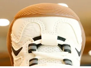 Detail of baby walking shoe with breathable mesh, synthetic leather, and non-slip rubber toe