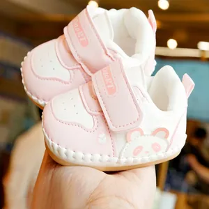 Pink panda cartoon baby walking shoes with soft non-slip soles and velcro straps