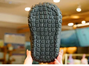 Close-up of non-slip rubber sole with size marking for toddler walking shoes