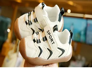 Close-up of toddler walking shoes featuring a non-slip rubber sole and velcro sport closure