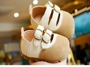 Detail of baby walking shoes with soft leather finish and non-slip rubber traction sole