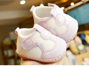 Detail of pink mesh baby shoes with non-slip soft sole and Velcro strap closure