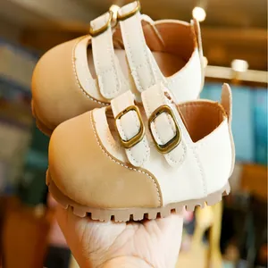 Toddler cream leather walking shoes with double strap buckles and anti-slip rubber soles