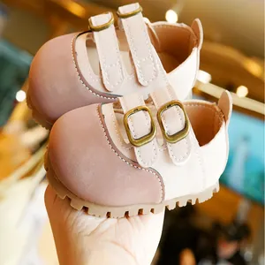 Pink and beige soft sole baby walking shoes with vintage bronze buckles for girls