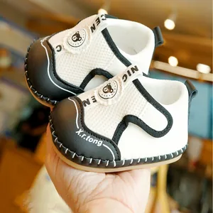 Breathable mesh baby walking shoes with soft non-slip soles and cute bear detail
