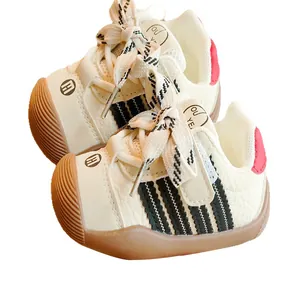 Breathable baby walking shoes with non-slip soft soles and black striped details