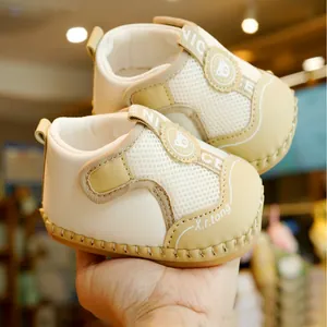 Breathable non-slip baby walking shoes with soft soles and cute bear pattern in beige